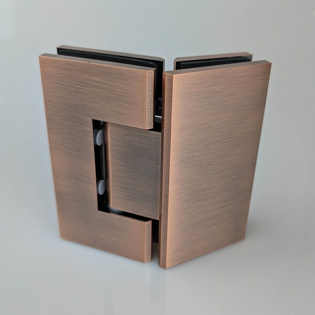 ES2.135 RC - 135 degree glass to glass shower hinge in a red copper